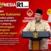 Presiden Prabowo Subianto menyampaikan pidato pada Munas XVIII HIPMI di Bandar Lampung sambil menanggapi kritik mengenai kunjungan luar negeri.