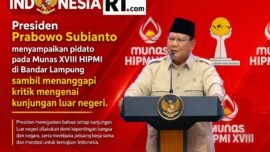 Presiden Prabowo Subianto menyampaikan pidato pada Munas XVIII HIPMI di Bandar Lampung sambil menanggapi kritik mengenai kunjungan luar negeri.